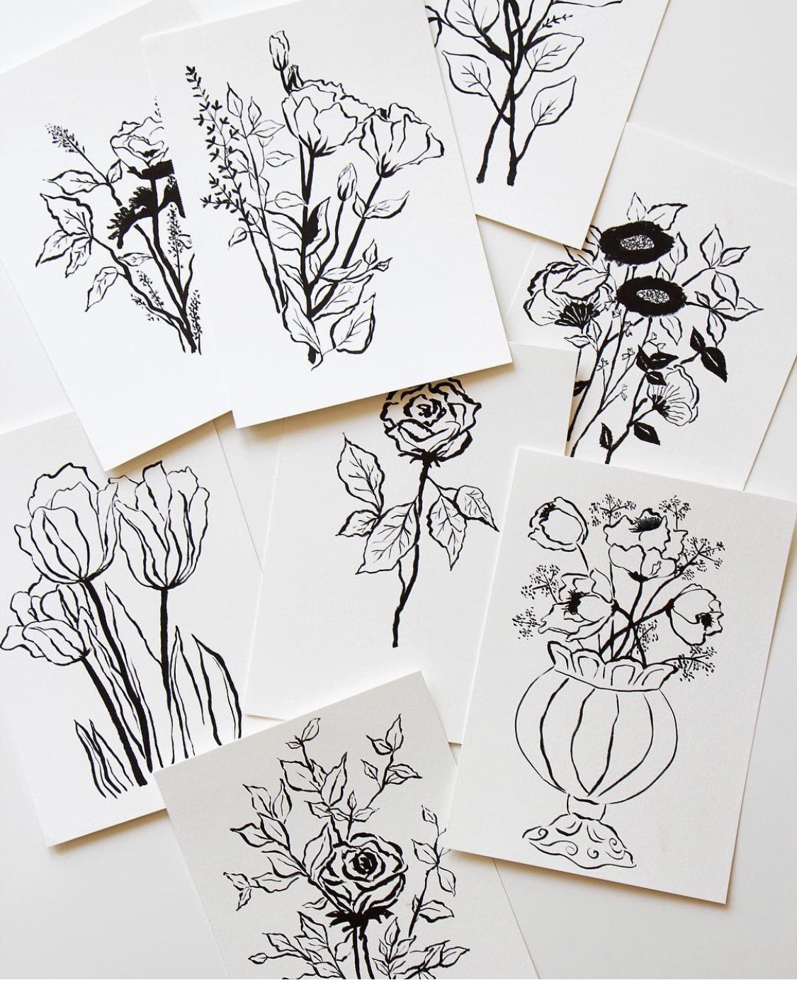 Amy Sinibaldi's black and white ink hand drawn flowers and vases.