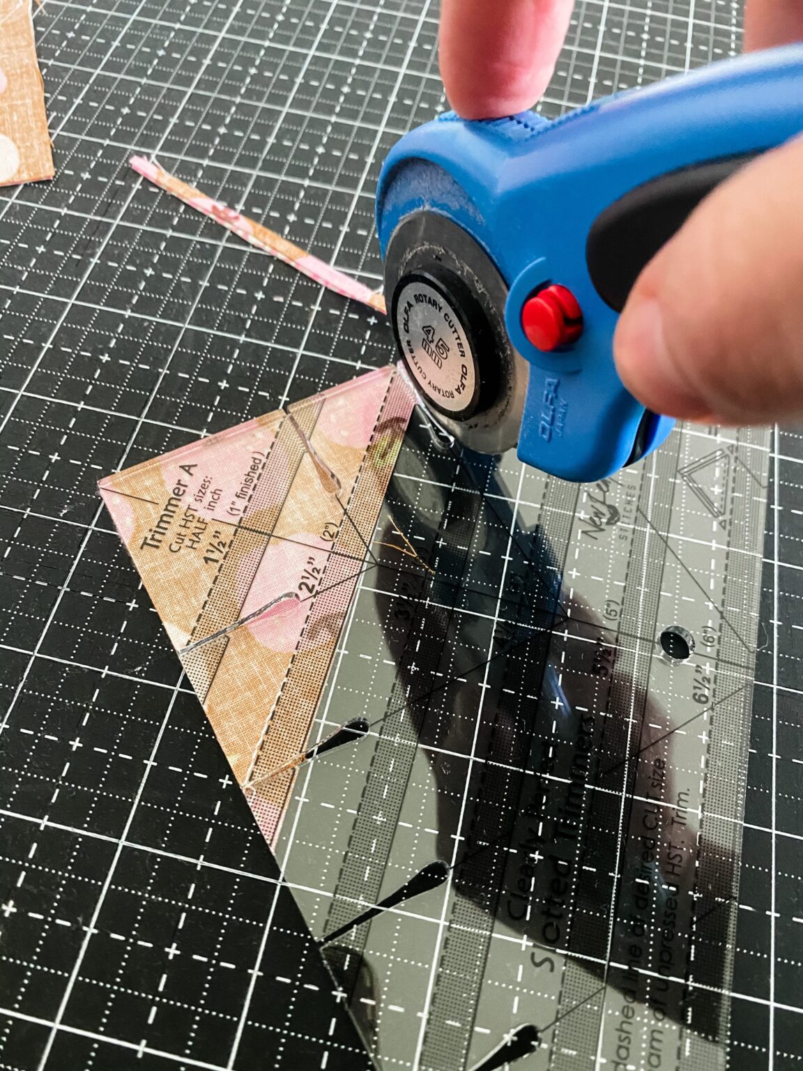 Learn to make perfect Half Square Triangles with this ruler