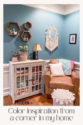 Cozy corner with comfy chair and blue wall for color inspiration