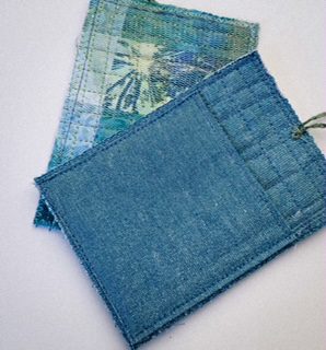 Pocket and tag string on the mini art quilt