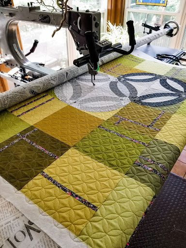 Orange Peel quilting design on greens and yellows