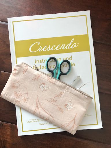 Crescendo Instruction pamphlet with the zipper pouch on top