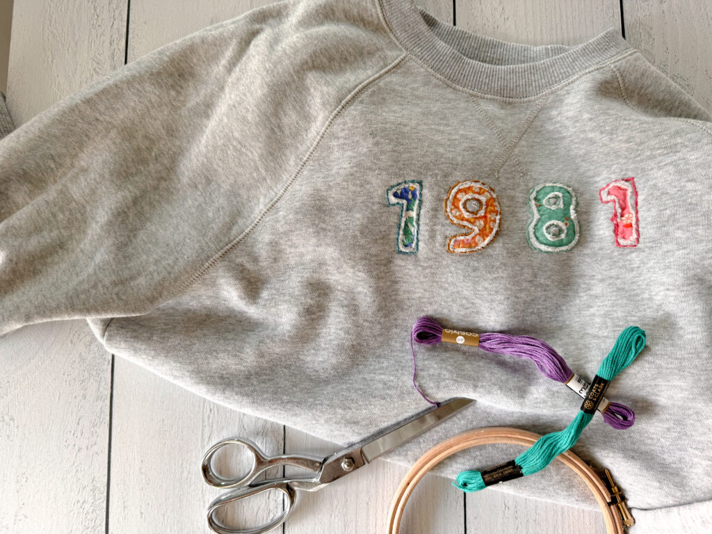 1981 reverse applique sweatshirt