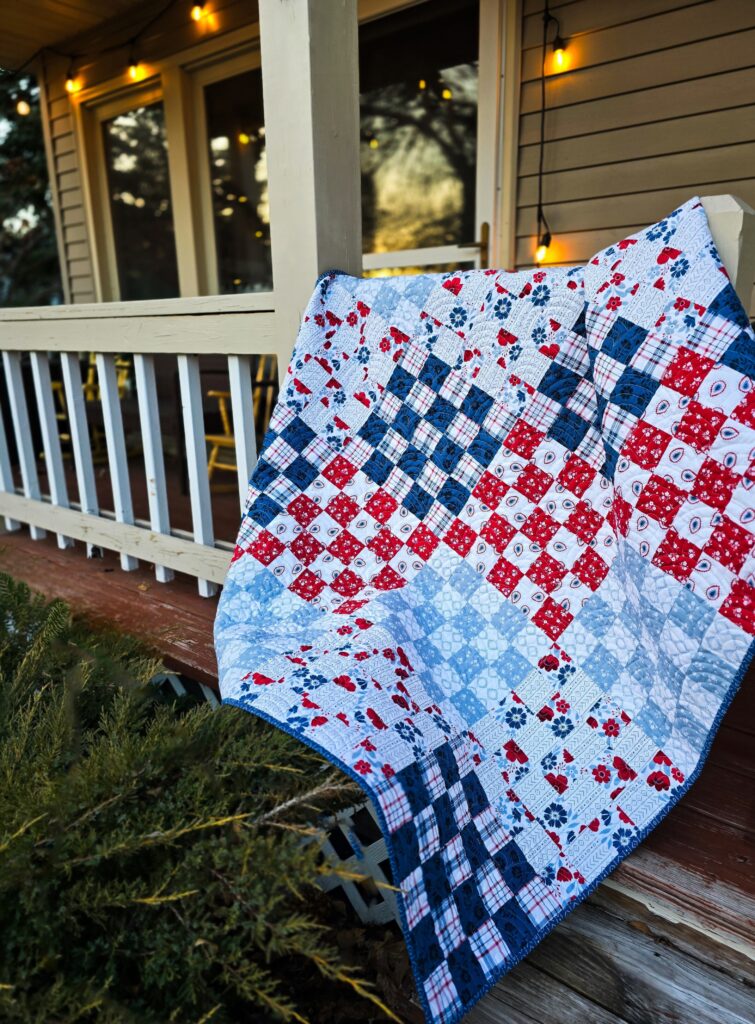 Heirloom Harmony quilt quilted with Baptist Fan pantograph, showing a classic and timeless quilting design